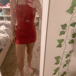 Red body con with sparkles